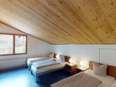 Schlafzimmer - Reka-Feriendorf Disentis