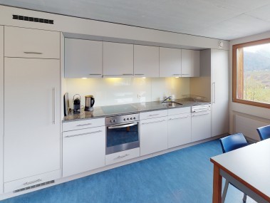 Kitchen with dining area - Reka Holiday Village Disentis