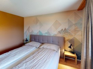 Schlafzimmer - Reka-Feriendorf Hasliberg