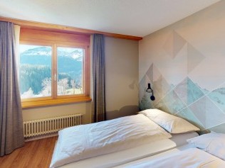 Schlafzimmer - Reka-Feriendorf Hasliberg