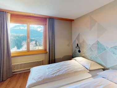 Schlafzimmer - Reka-Feriendorf Hasliberg