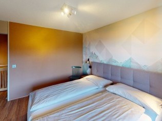 Schlafzimmer - Reka-Feriendorf Hasliberg