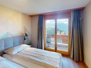 Schlafzimmer - Reka-Feriendorf Hasliberg