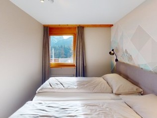 Schlafzimmer - Reka-Feriendorf Hasliberg