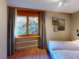 Schlafzimmer - Reka-Feriendorf Hasliberg