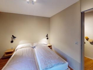 Schlafzimmer - Reka-Feriendorf Hasliberg