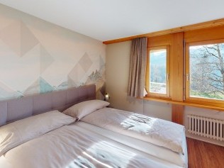 Schlafzimmer - Reka-Feriendorf Hasliberg