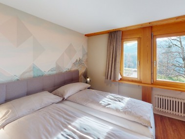 Schlafzimmer - Reka-Feriendorf Hasliberg