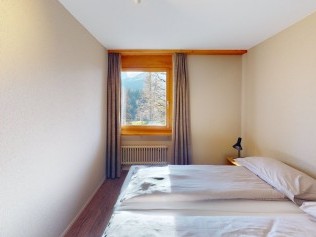 Schlafzimmer - Reka-Feriendorf Hasliberg