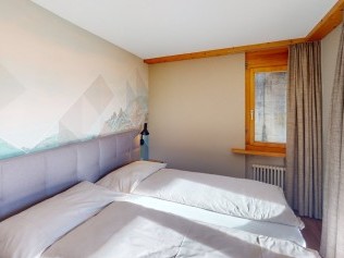 Schlafzimmer - Reka-Feriendorf Hasliberg
