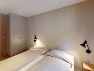 Schlafzimmer - Reka-Feriendorf Hasliberg