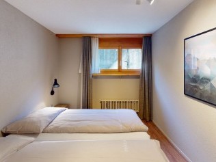 Schlafzimmer - Reka-Feriendorf Hasliberg