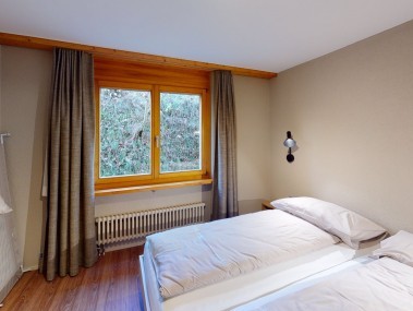Schlafzimmer - Reka-Feriendorf Hasliberg