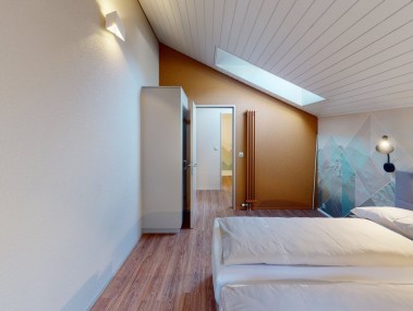 Schlafzimmer - Reka-Feriendorf Hasliberg