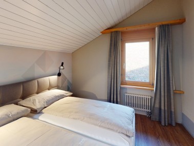 Schlafzimmer - Reka-Feriendorf Hasliberg
