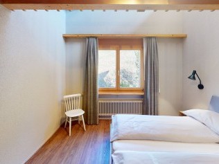 Schlafzimmer - Reka-Feriendorf Hasliberg