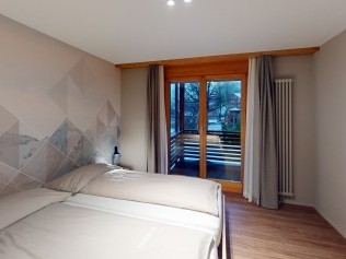 Schlafzimmer - Reka-Feriendorf Hasliberg