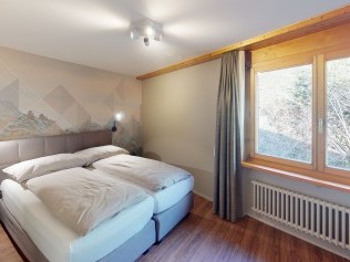 Schlafzimmer - Reka-Feriendorf Hasliberg