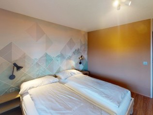 Schlafzimmer - Reka-Feriendorf Hasliberg