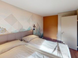 Schlafzimmer - Reka-Feriendorf Hasliberg