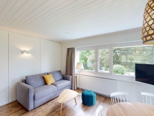 Wohnzimmer mit Essbereich - Reka-Feriendorf Montfaucon