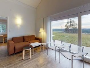 Wohnzimmer mit Essbereich - Reka-Feriendorf Montfaucon