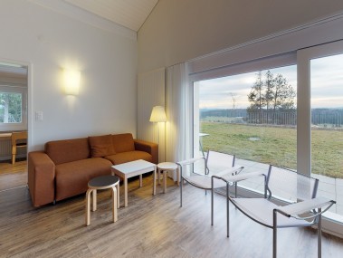 Wohnzimmer mit Essbereich - Reka-Feriendorf Montfaucon