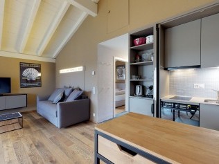 Wohnzimmer mit Essbereich - Reka-Feriendorf Montfaucon