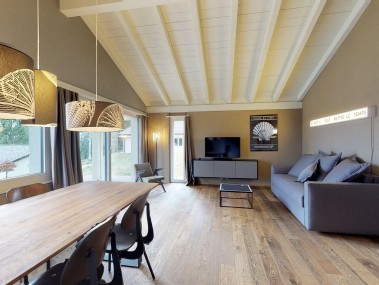 Living room with dining area - Reka Holiday Village Montfaucon