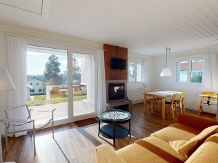 Wohnzimmer mit Essbereich - Reka-Feriendorf Montfaucon