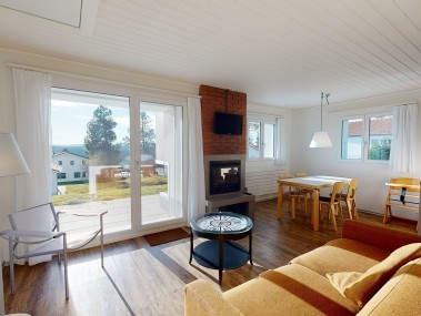 Living room with dining area - Reka Holiday Village Montfaucon