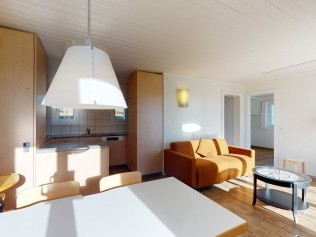 Wohnzimmer mit Essbereich - Reka-Feriendorf Montfaucon