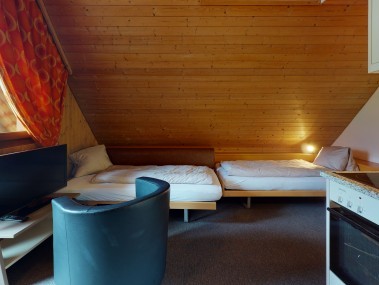 Salon et chambre à coucher - Village de vacances Reka Wildhaus