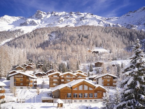 Exterior view in winter - Reka Holiday Village Zinal