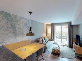 Wohnzimmer mit Essbereich - Reka-Feriendorf Zinal