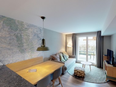 Wohnzimmer mit Essbereich - Reka-Feriendorf Zinal