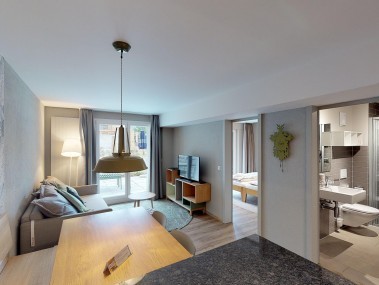 Wohnzimmer mit Essbereich - Reka-Feriendorf Zinal