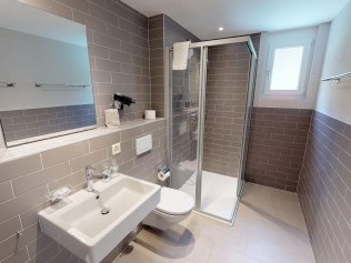 Badezimmer - Reka-Feriendorf Zinal