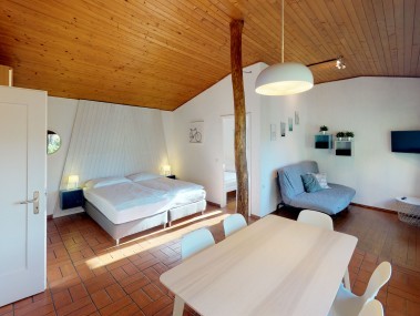 Wohnzimmer mit Essbereich - Reka-Ferienanlage Brissago