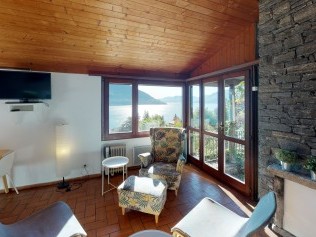 Wohnzimmer mit Essbereich - Reka-Ferienanlage Brissago