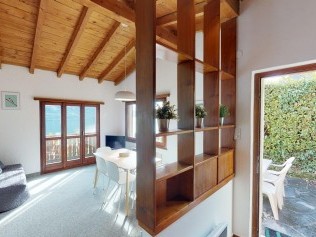 Wohnzimmer mit Essbereich - Reka-Ferienanlage Brissago