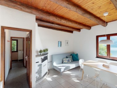 Wohnzimmer mit Essbereich - Reka-Ferienanlage Brissago