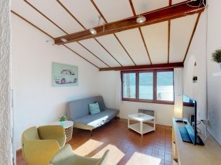 Wohnzimmer - Reka-Ferienanlage Brissago