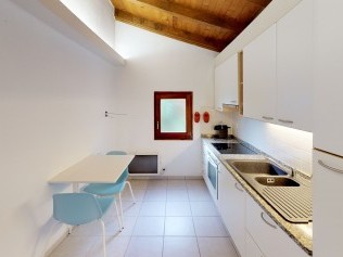 Küche mit Essbereich - Reka-Ferienanlage Brissago