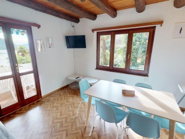 Wohnzimmer mit Essbereich - Reka-Ferienanlage Brissago