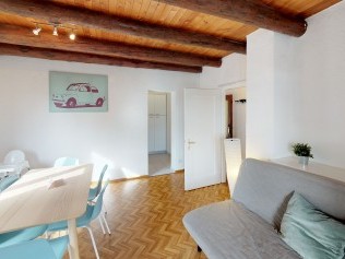 Wohnzimmer mit Essbereich - Reka-Ferienanlage Brissago