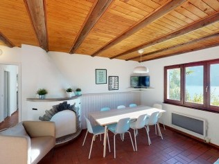 Wohnzimmer mit Essbereich - Reka-Ferienanlage Brissago