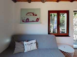 Wohnzimmer mit Essbereich - Reka-Ferienanlage Brissago