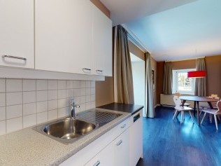 Küche - Reka-Ferienanlage Chesa Engadina Madulain