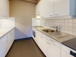 Küche - Reka-Ferienanlage Chesa Engadina Madulain